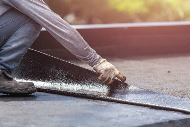 Professional Waterproofing technician working in Hartland, MI